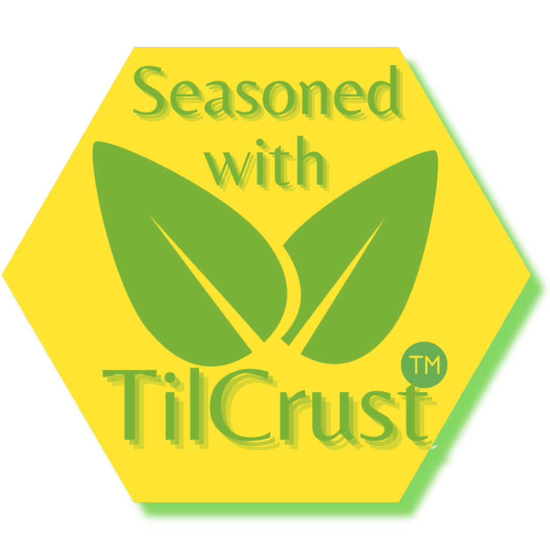 TilCrust™ logo — hexagonal emblem with two leaves