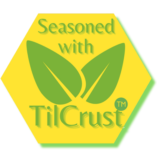 TilCrust™ logo — hexagonal emblem with two leaves
