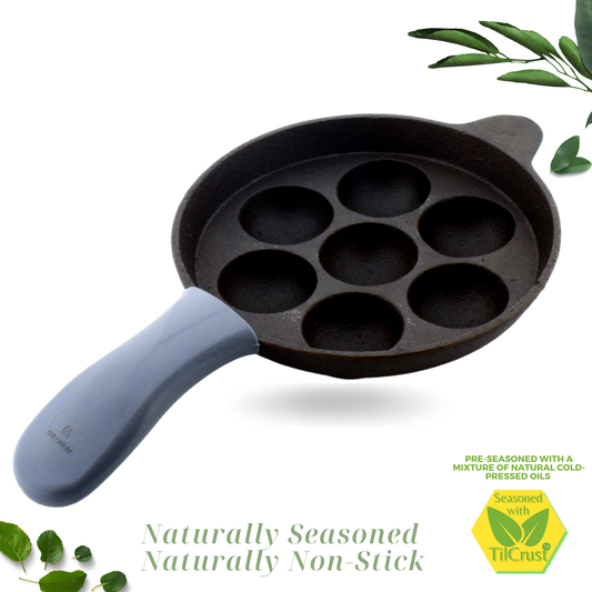 Cast Iron Paniyaram Pan 7 Pits | Pre-Seasoned | 7.6 Inches | 2 Kgs | Long Handle | with Silicone Sleeve | Induction Compatible