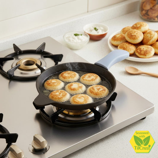Cast Iron Paniyaram Pan 7 Pits | Pre-Seasoned | 7.6 Inches | 2 Kgs | Long Handle | with Silicone Sleeve | Induction Compatible